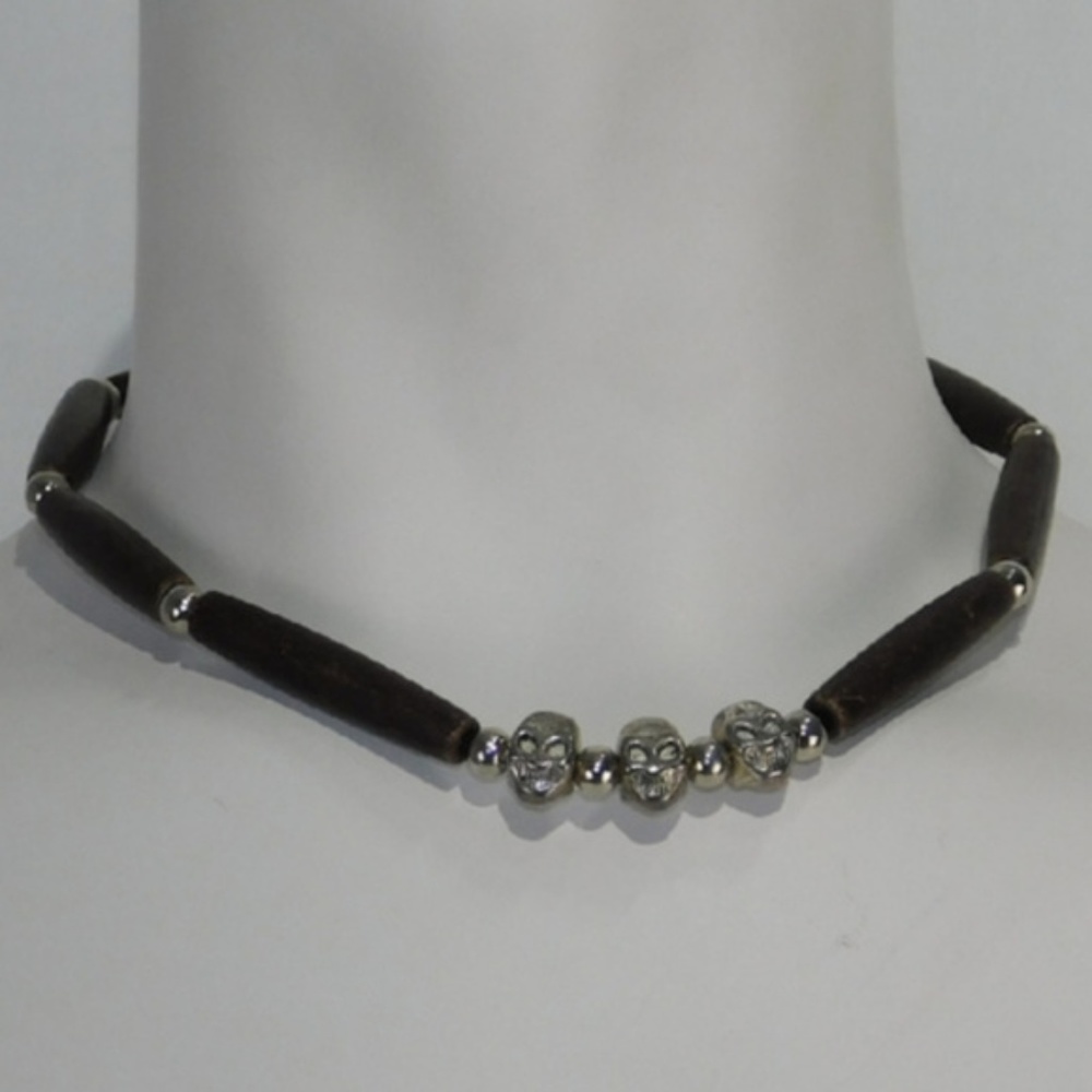 Multi-media Links Silvertone Skull Necklace.